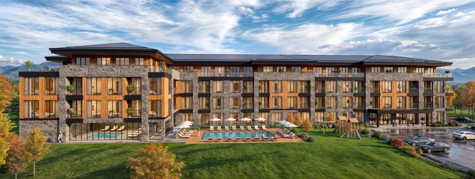 Heated outdoor pool with mountain panorama in summer